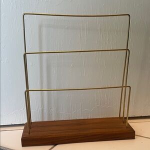 Gold and wood earring stand